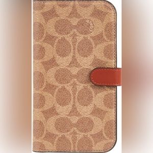 Coach Iphone 14, 15 Folio In Signature Canvas. NWT in the color khaki